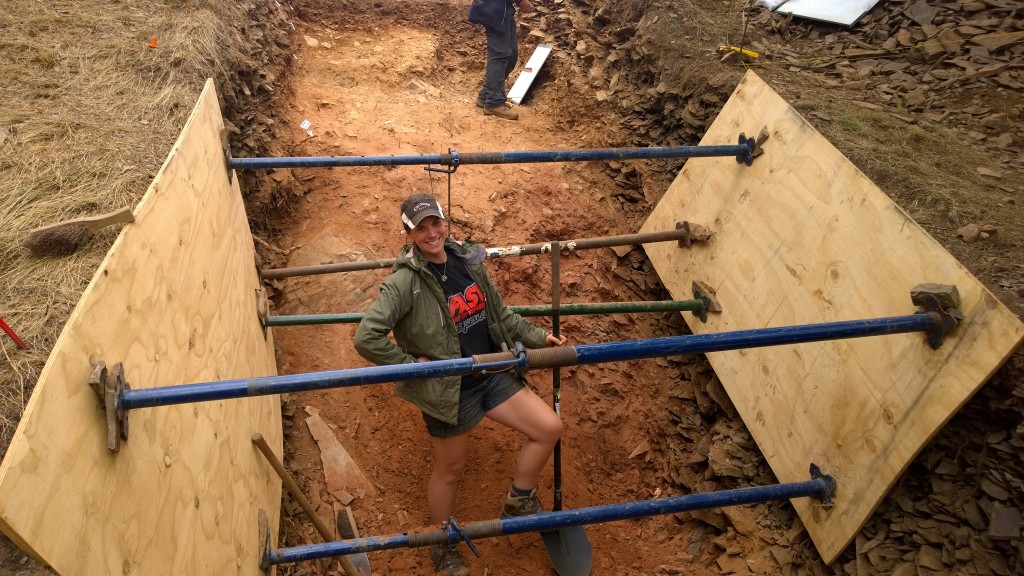 Erin excavating Moel y Gaer hillfort ditch, Bodfari